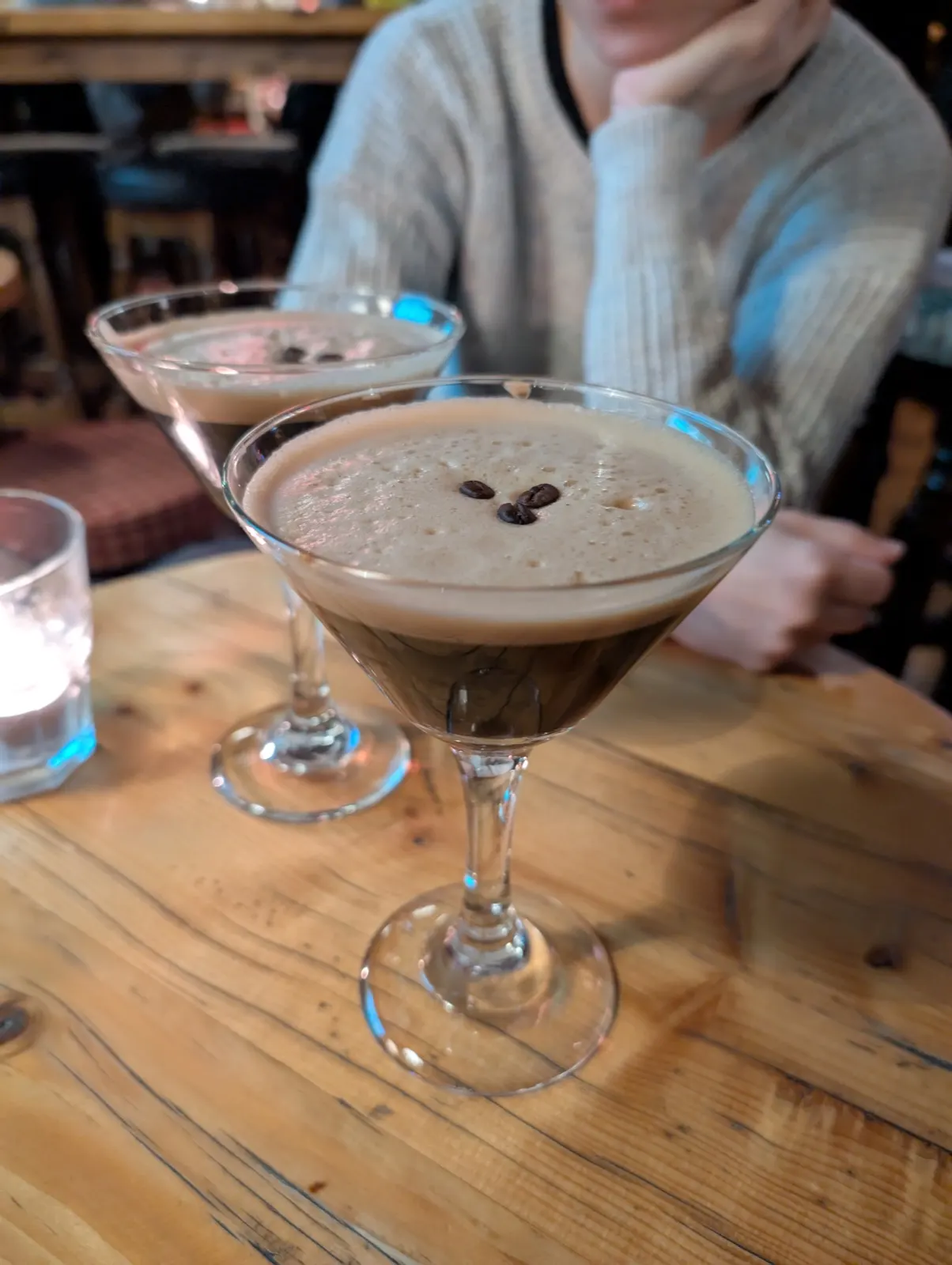 A zero-proof Espresso Martini-style drink with coffee foam